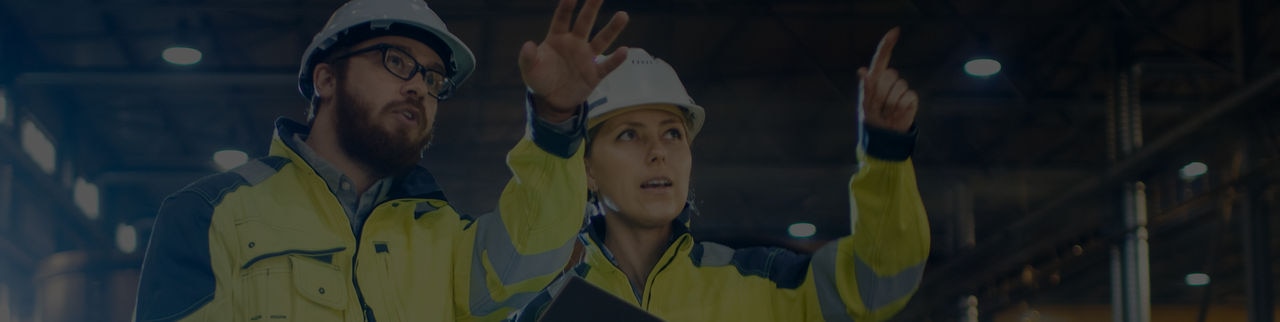 Two people at factory